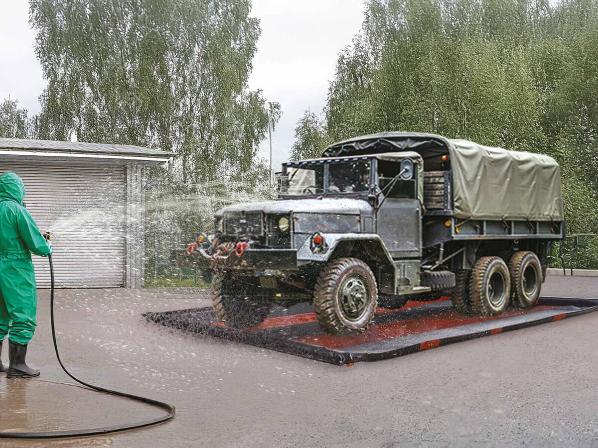 Vehicle on a decontamination mat