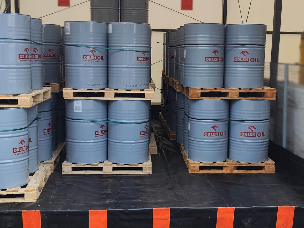 IBCs and drums in flexible spill trays in a commercial building