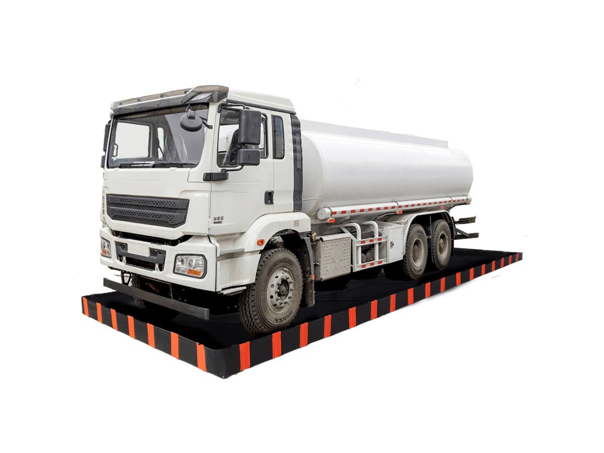 Drive-in spill tray for a tanker truck