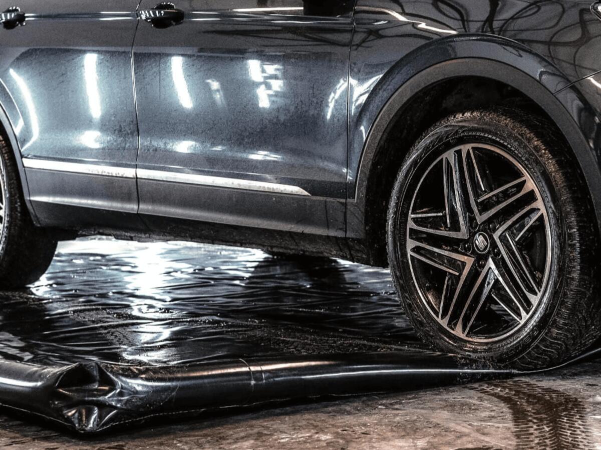 Car on a wash mat
